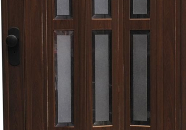 Porta a soffietto con Vetrata