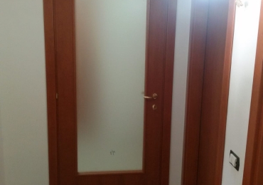 Porta con vano vetro